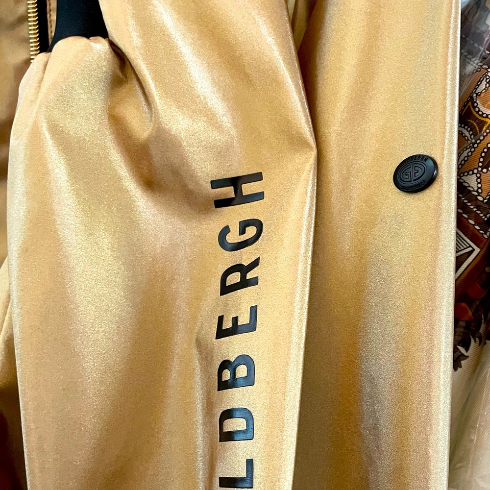 NWOT GOLDBERGH LUXURY SPORTS GOLD POWER STRETCH WINDBREAKER JACKET WOMENS SMALL